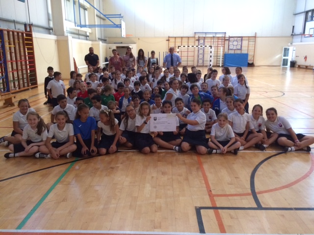 St Joseph’s Middle School present a cheque to Pathway Through Pain