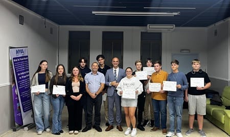 Minister Santos presents Young Leaders with Certificates